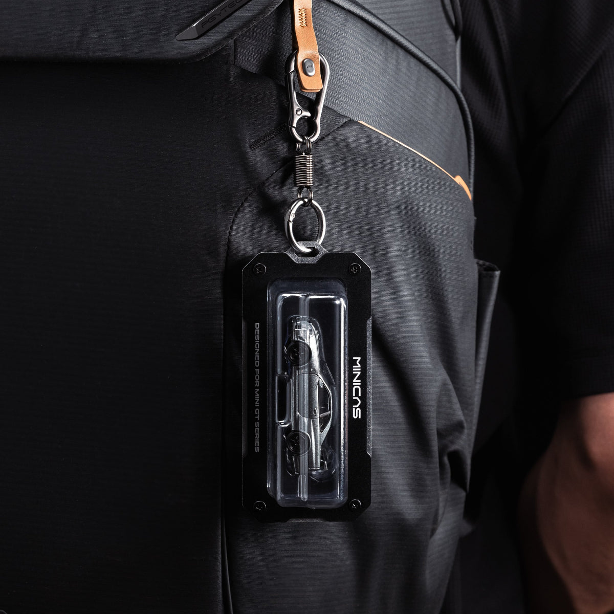 GT-TAG 64 with MINI GT blister — side angle